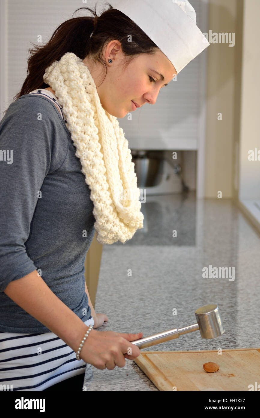 Youth almond shell cracking Stock Photo Alamy