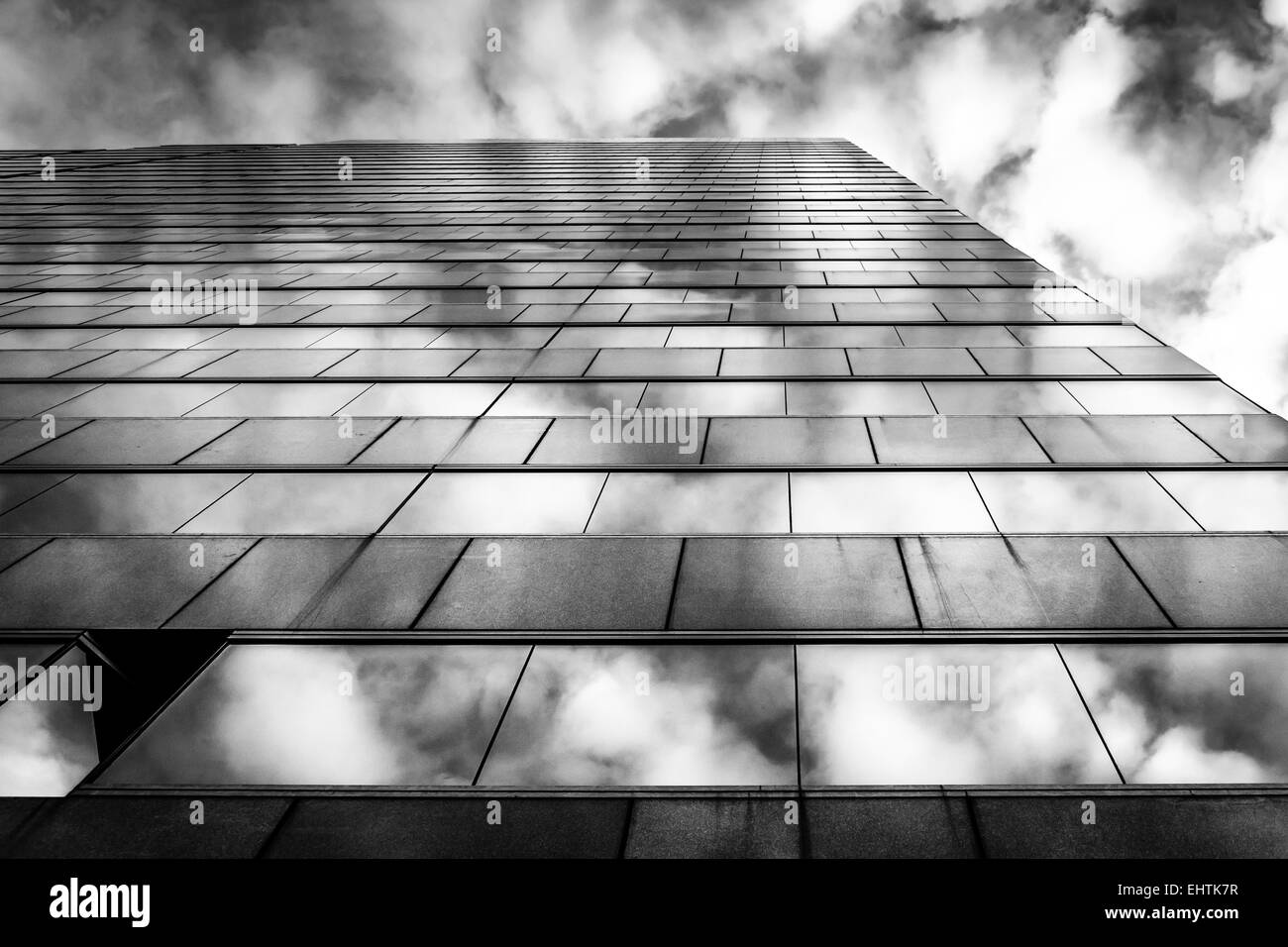 Evening sky reflecting in modern glass architecture at 250 West Pratt Street, in Baltimore, Maryland. Stock Photo