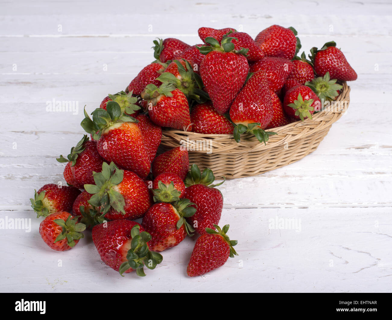 pile of strawberries on white background Stock Photo - Alamy