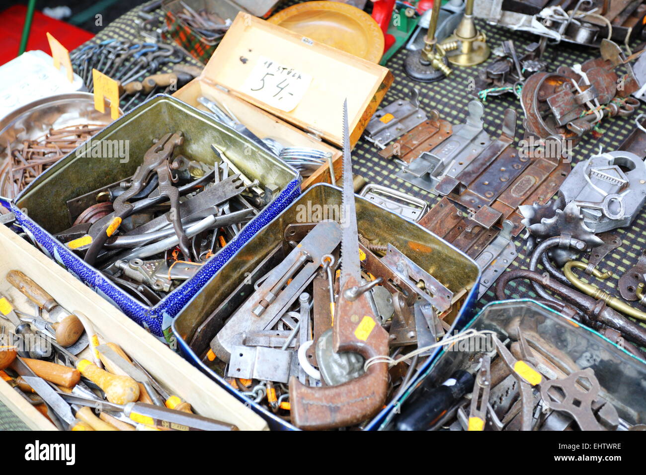 Old tools and hardware on the flea market. Stock Photo