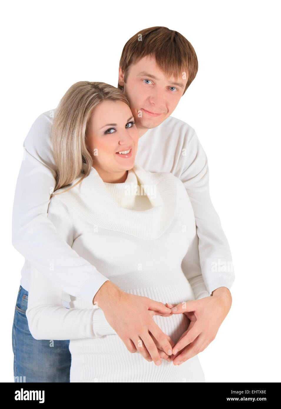 Heart from hands on belly of pregnant woman Stock Photo