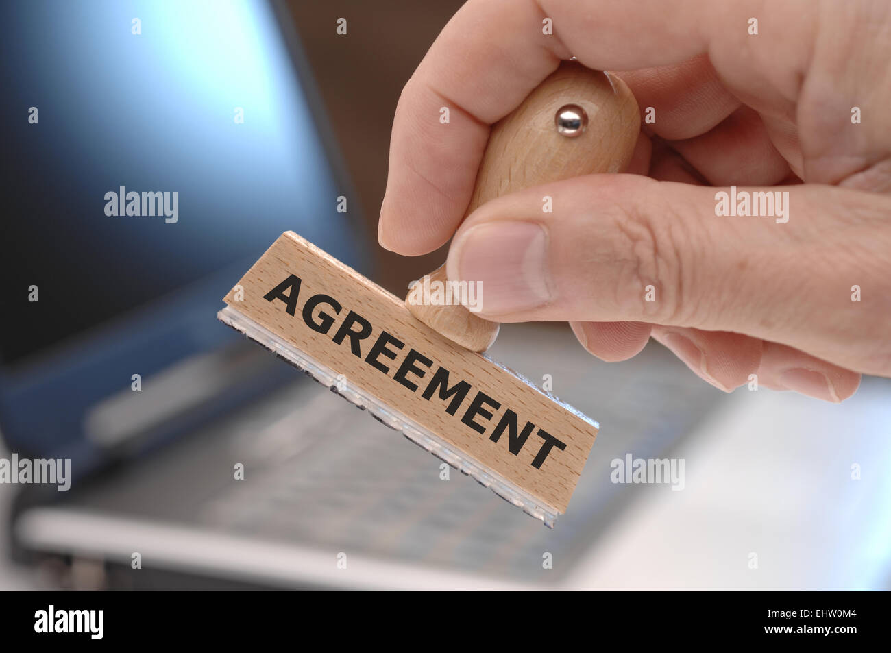 agreement marked on rubber stamp Stock Photo