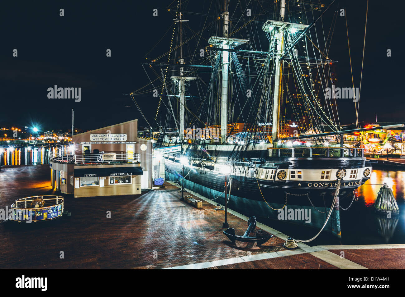 The USS Constellation at night, in the Inner Harbor of Baltimore, Maryland. Stock Photo