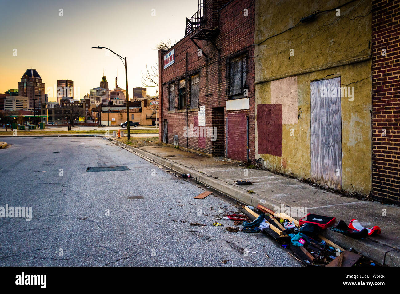 Trash on a sidewalk at Old Town Mall, in Baltimore, Maryland Stock