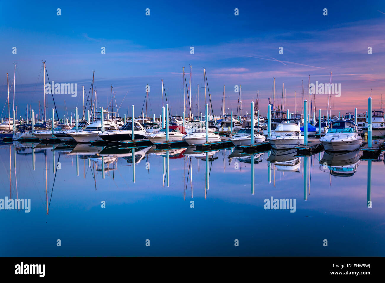 Twilight reflections at a marina in Canton, Baltimore, Maryland. Stock Photo