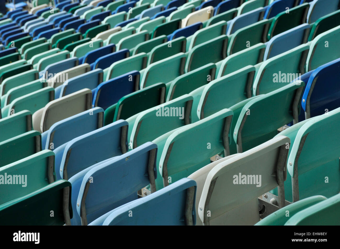 Rows Of Colourful Empty Folding Seats In A Soccer Stadium Stock