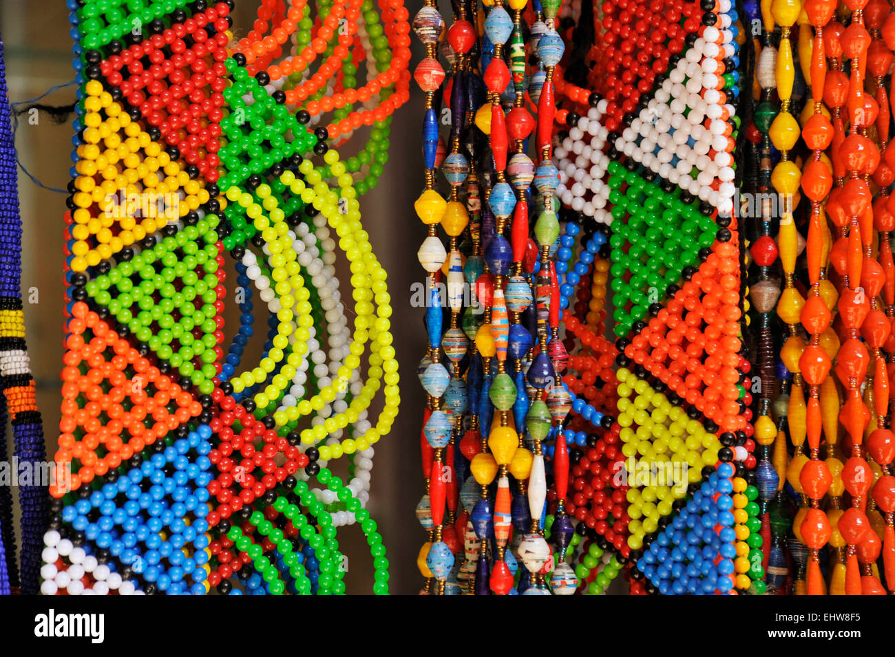 Traditional beaded Zulu costume jewellery and colourful necklaces for sale to tourists at Victoria Street Indian market, Durban, KZN, South Africa Stock Photo
