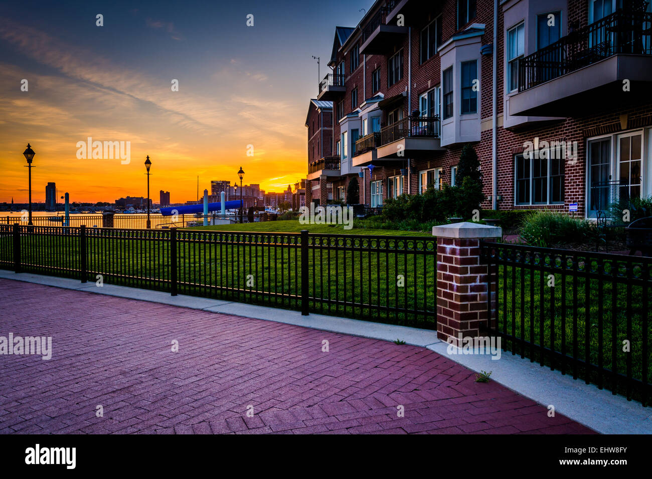 Waterfront condominiums and promenade at sunset, in Canton, Baltimore