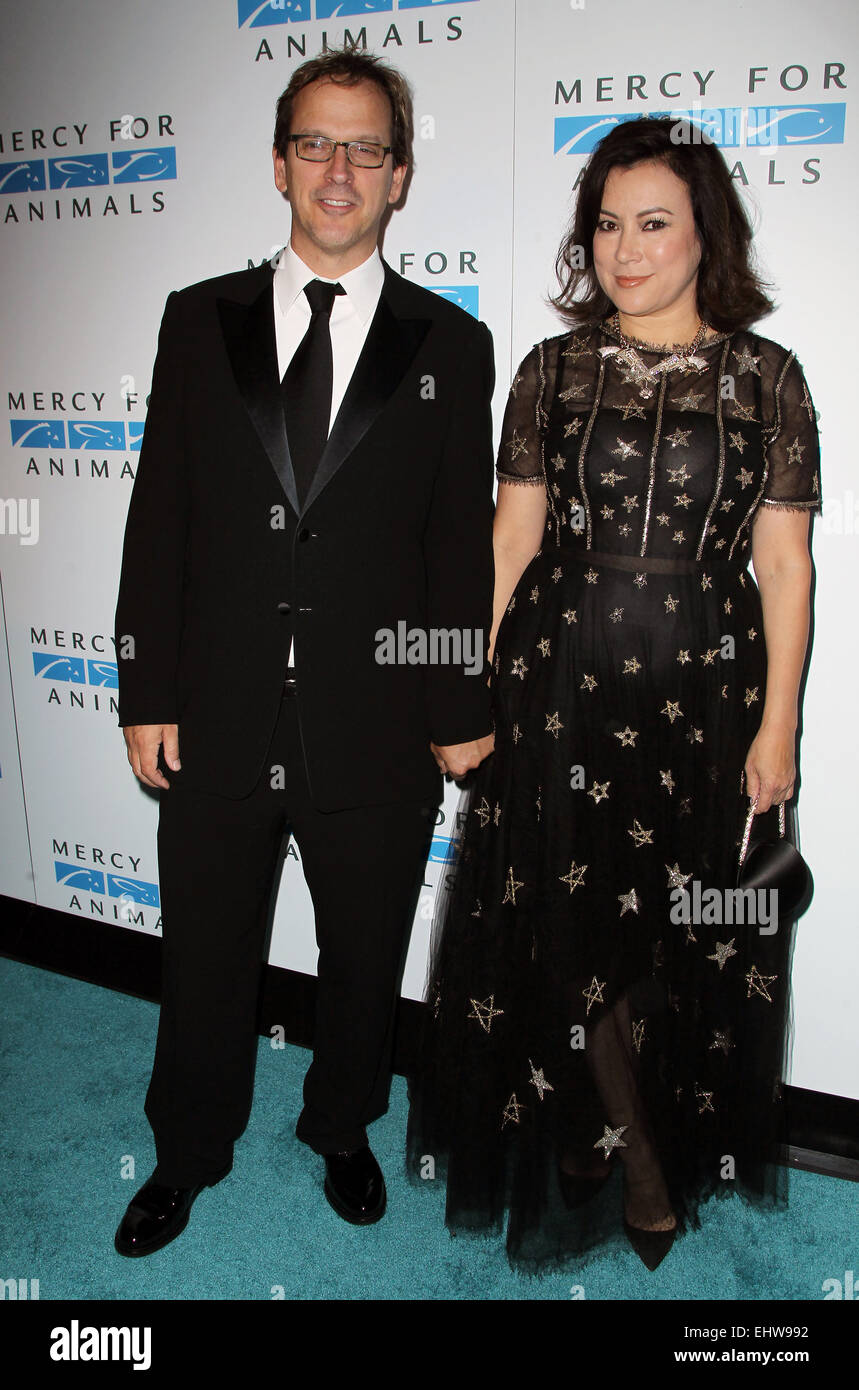 MERCY FOR ANIMALS 15TH ANNIVERSARY GALA Featuring: Jennifer Tilly,Phil Laak Where: West Hollywood, California, United States When: 13 Sep 2014 Stock Photo