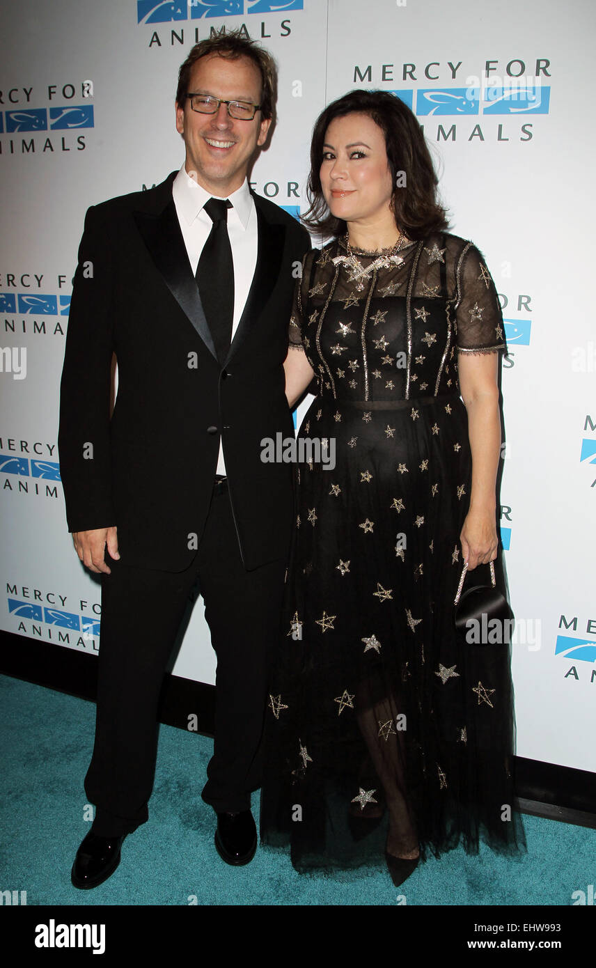 MERCY FOR ANIMALS 15TH ANNIVERSARY GALA Featuring: Jennifer Tilly,Phil Laak Where: West Hollywood, California, United States When: 13 Sep 2014 Stock Photo