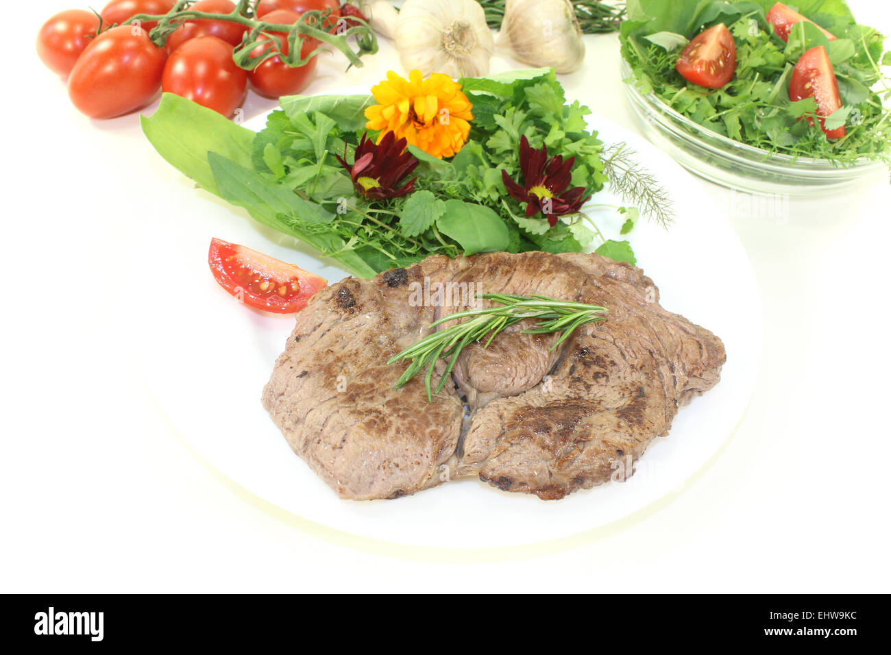 ribeye steak with wild herb salad Stock Photo
