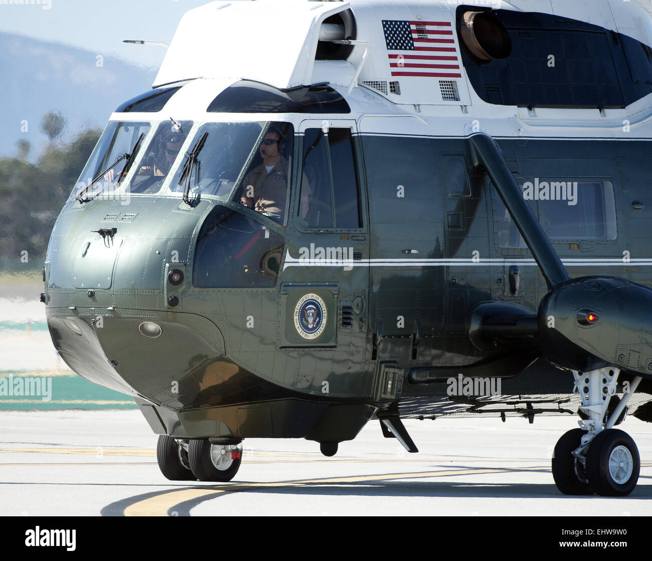 Los Angeles, California, USA. 12th Mar, 2015. Sikorsky's SH-3 Sea King helicopter has been in use by the US Marine Corps' HMX-1 squadron as the first choice for Marine One since not long after it was placed in service by the US Navy in 1961. The familiar metallic green with white top Sea King is transported, along with the presidential limousine and other large equipment via a set of several C-17 Boeing Globemaster or C-5 Galaxy transport aircraft operated by the US Air Force. US Navy specifications allow for the rotors to fold back as well as the tail to save space in shipboard situations. Stock Photo