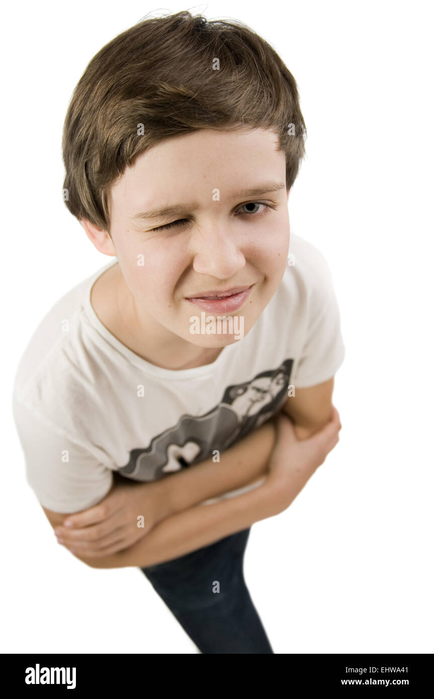 boy twinkle with crossing arms Stock Photo - Alamy