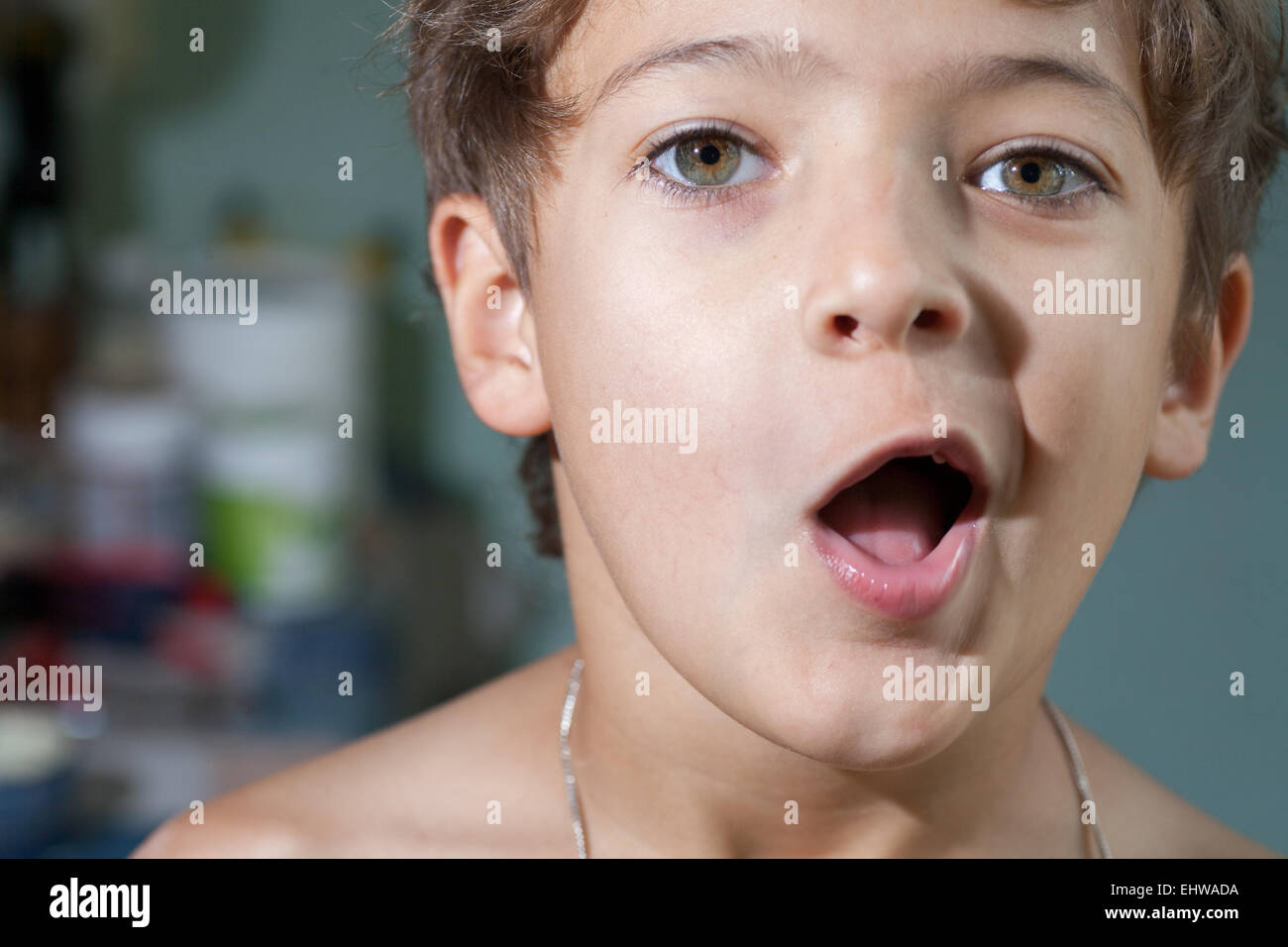 boy make faces - amazing emotion Stock Photo