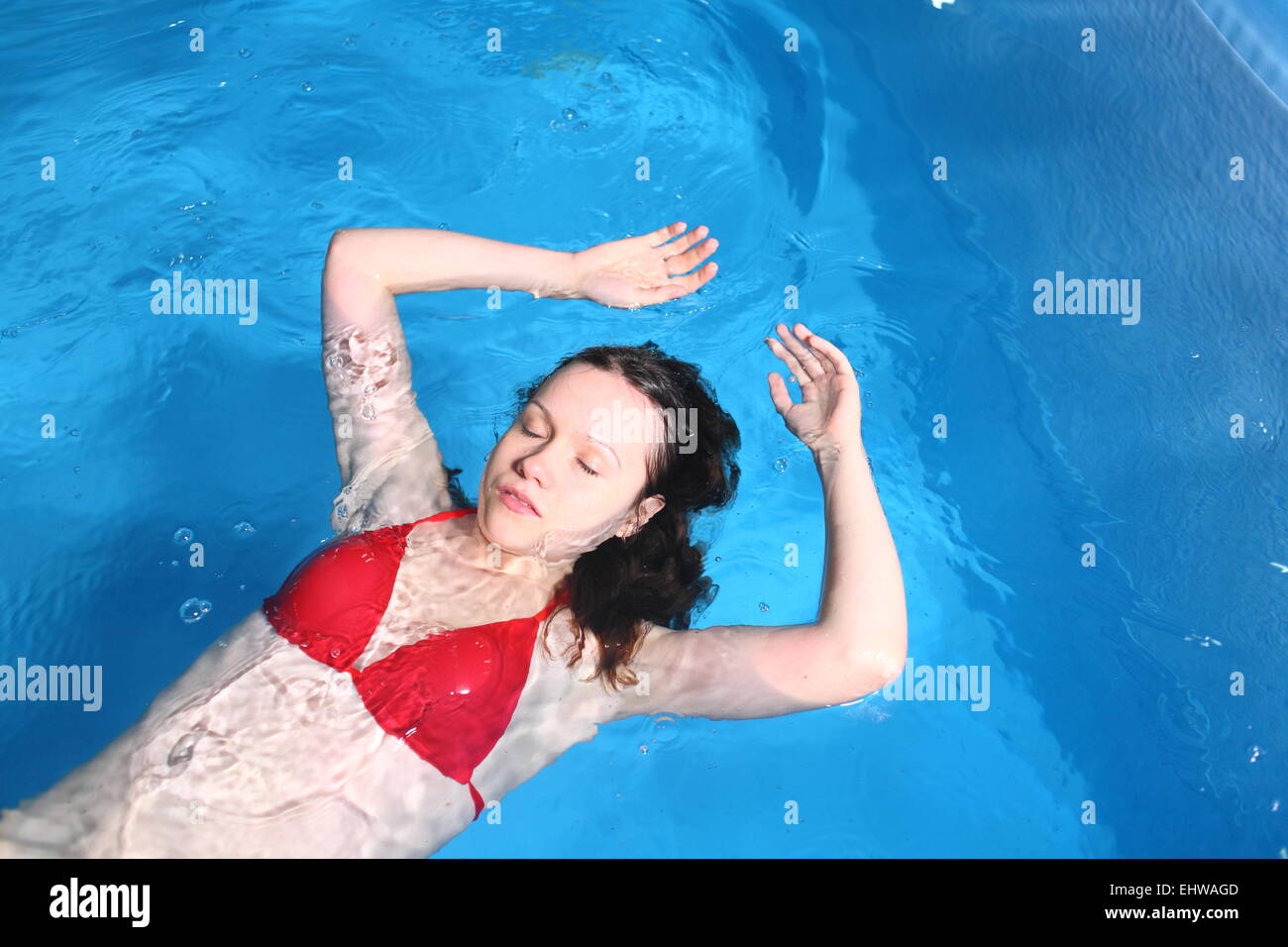 Red bikini in pool hi-res stock photography and images - Alamy