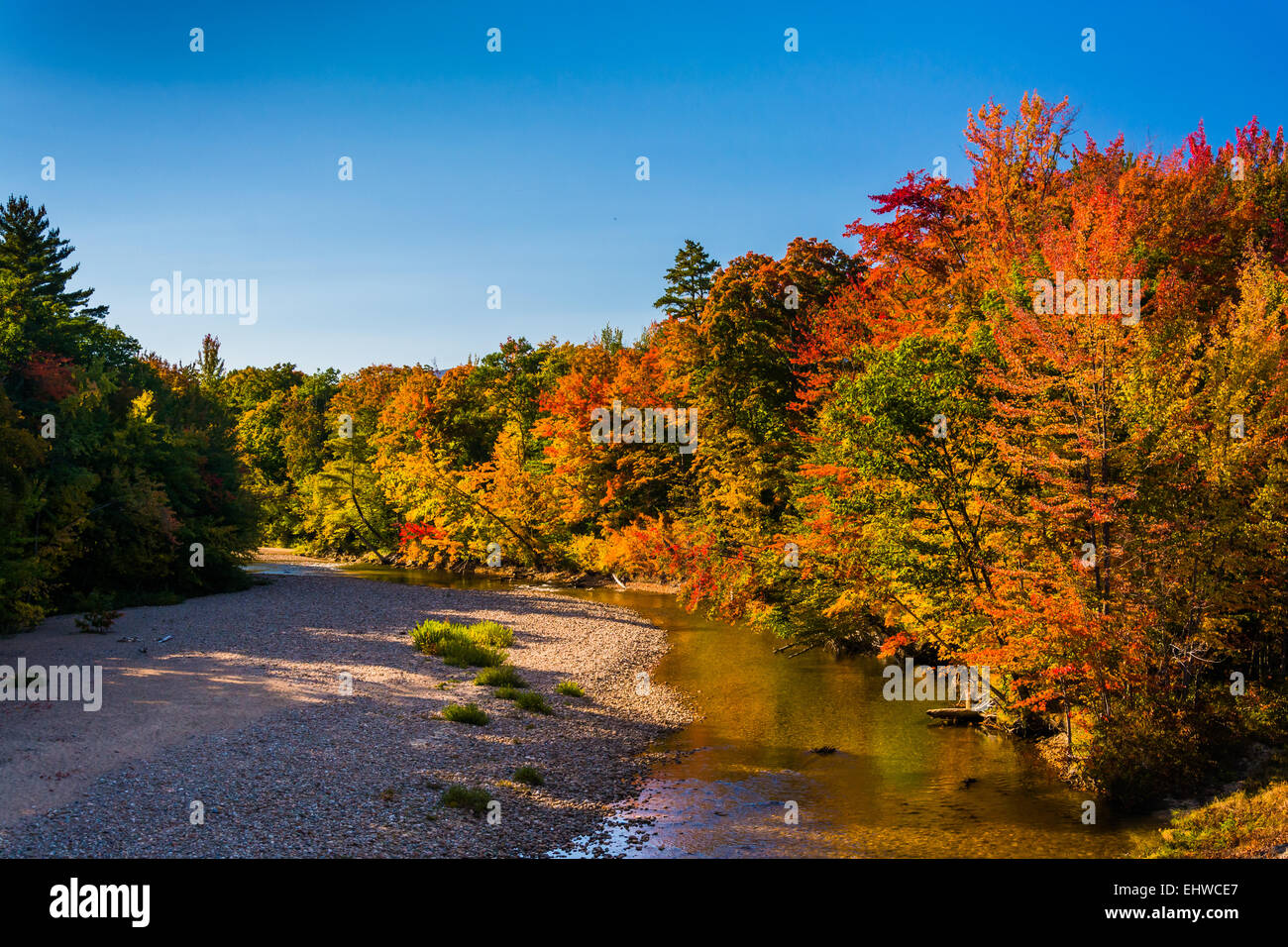 Autumn color along the Swift River in Conway, New Hampshire. Stock Photo