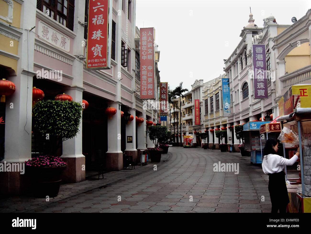 (150318) -- BEIJING, March 18, 2015 (Xinhua) -- Photo taken on March 8, 2015 shows a rebuilt Qilou commercial street in Zhongshan City, south China's Guangdong Province. Qilou buildings, or arcade-houses, were first popular in Europe and was then introduced to the world. China's first Qilou building was built in Guangzhou, capital of south China's Guangdong Province, which is also among the first coastal cities to embrace foreign culture and begin modernization. In the 30s and 40s, the Qilou architecture started to prevail in China's southern parts like Guangdong, Guangxi, Hainan and Fujian, Stock Photo