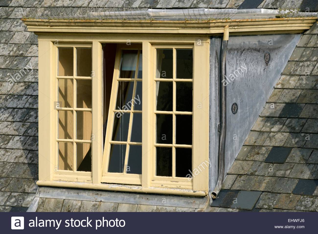 Close Up Of A Flat Roof Dormer With A Bottom Opening Window In The