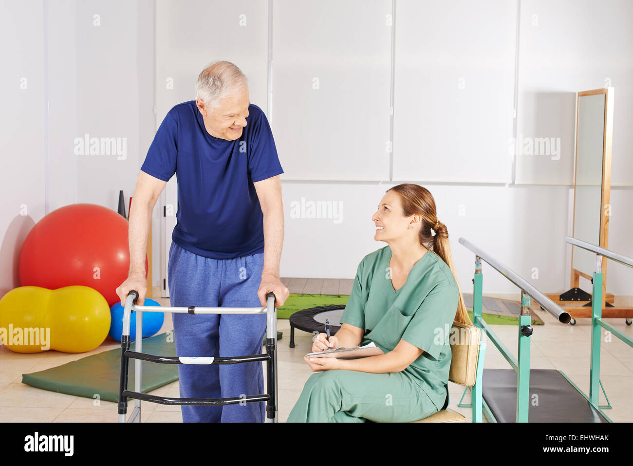 Old man with walker in physical therapy in a nursing home Stock Photo Alamy