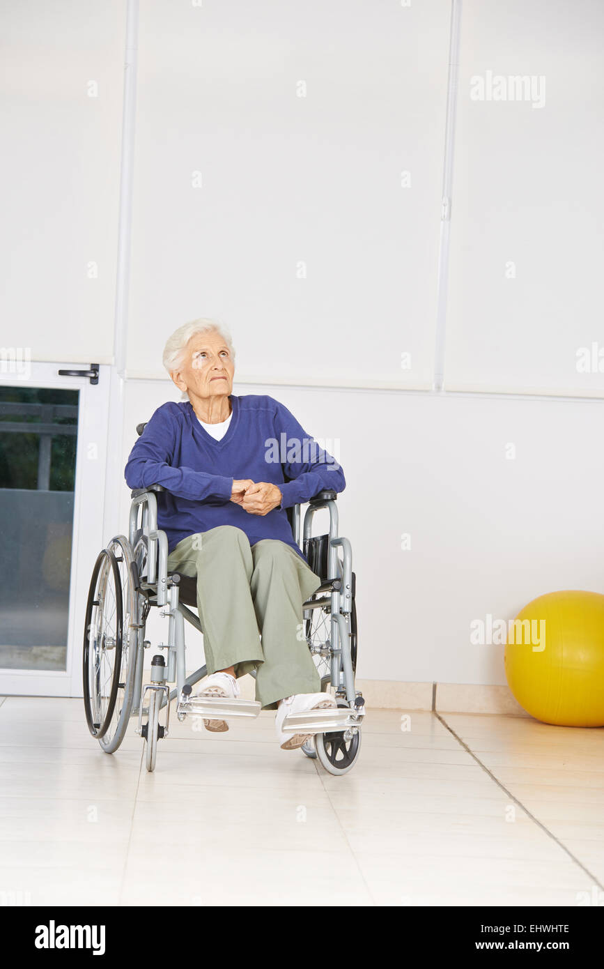 Sad old woman in wheelchair hi-res stock photography and images - Alamy