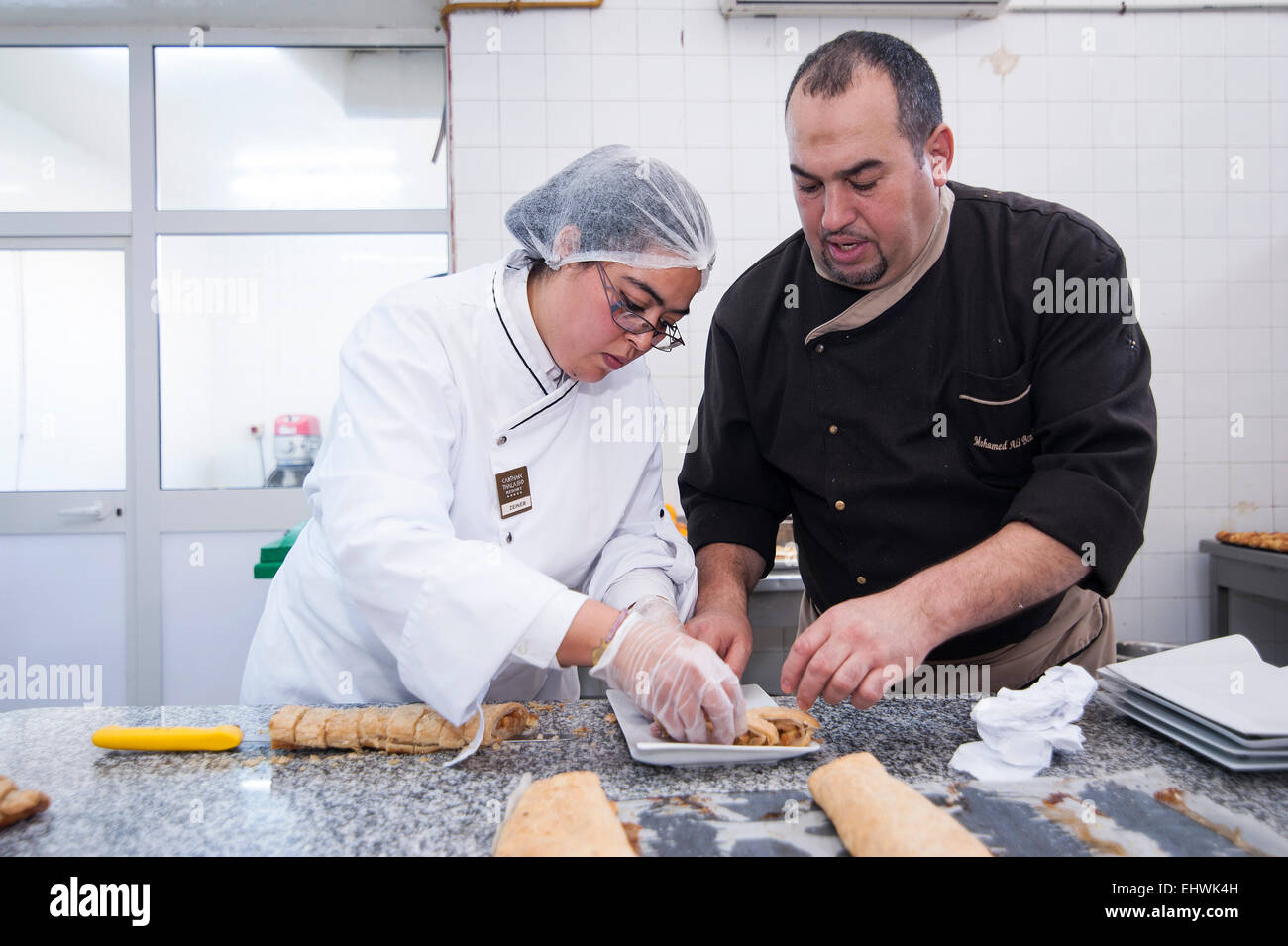 TUNISIA, TUNIS: Woman works in the kitchen of Carthage Thalasso Resort Stock Photo