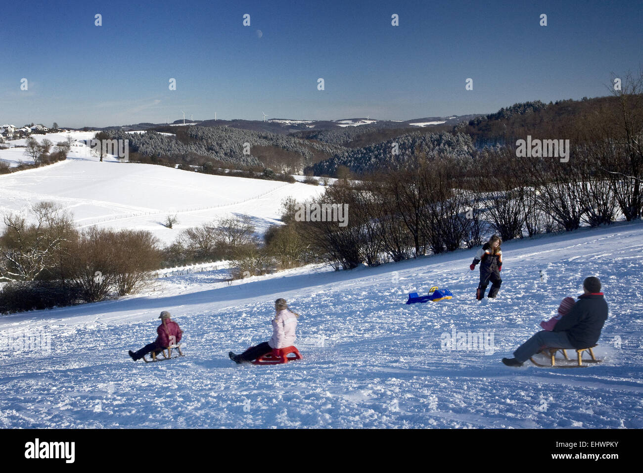 Sledding in winter Breckerfeld, Germany Stock Photo Alamy