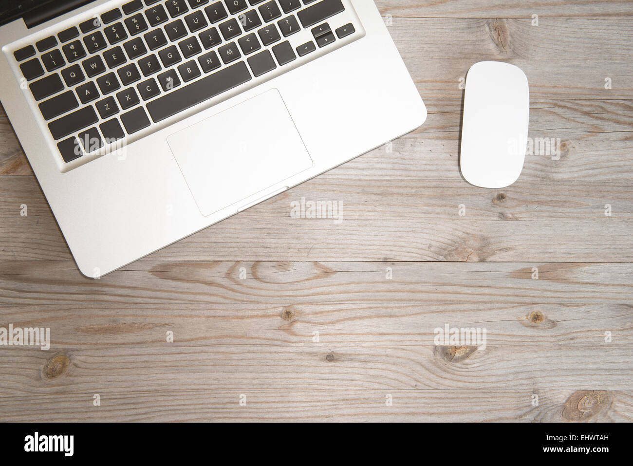 Working table overhead view, wooden table in vintage tone. Stock Photo