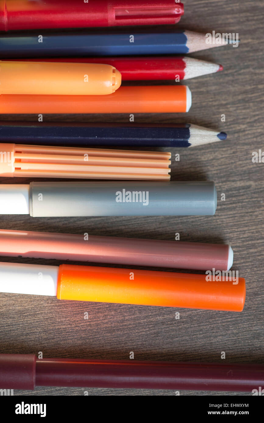 Markers and crayons on table hi-res stock photography and images - Alamy