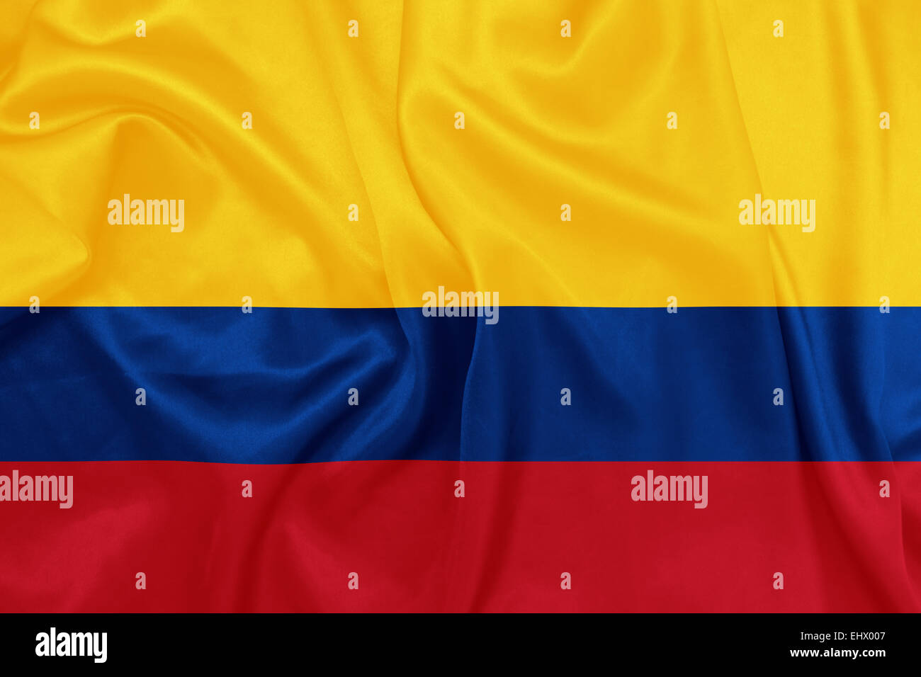 Colombia - Waving national flag on silk texture Stock Photo