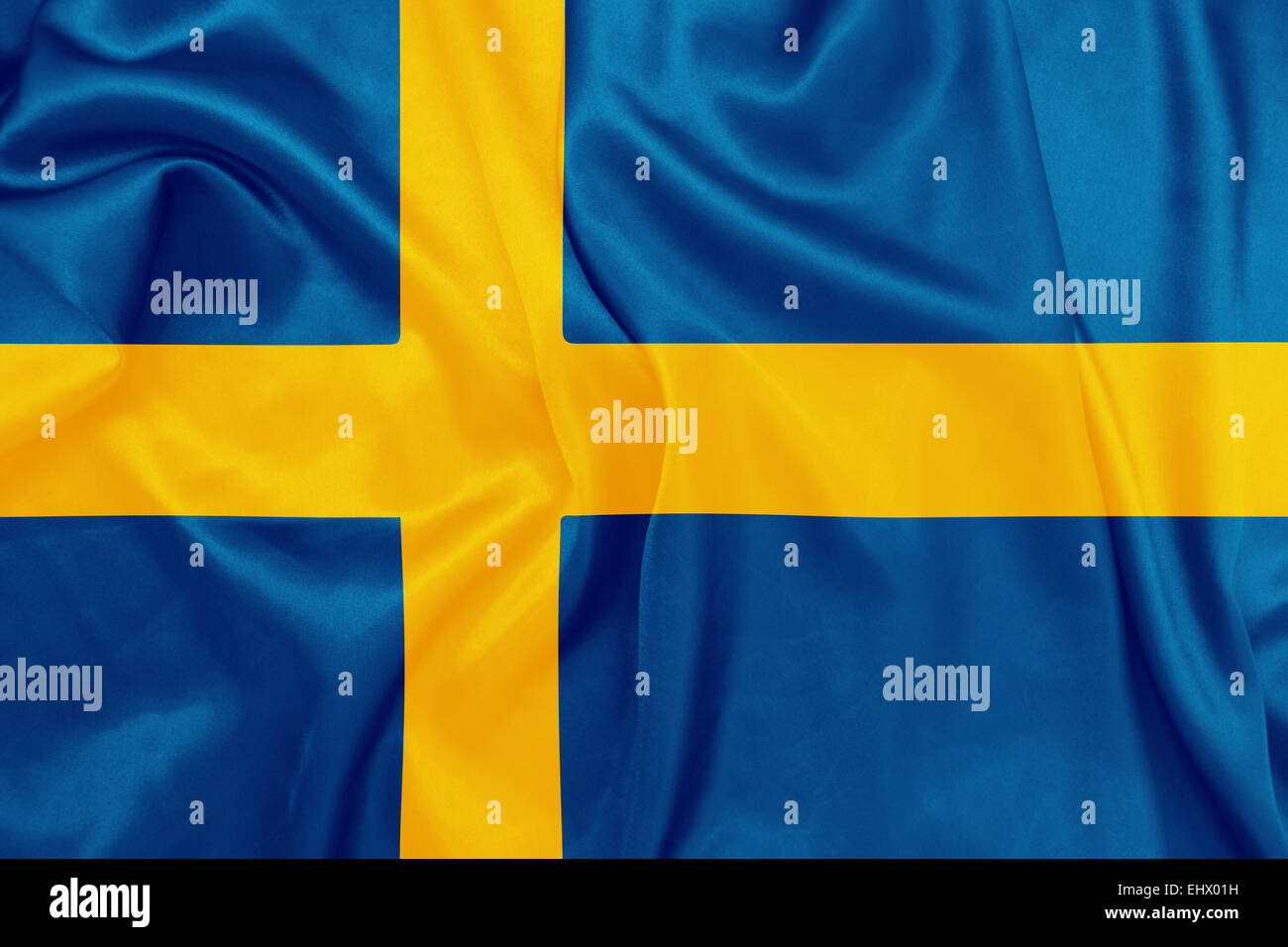 Sweden - Waving national flag on silk texture Stock Photo