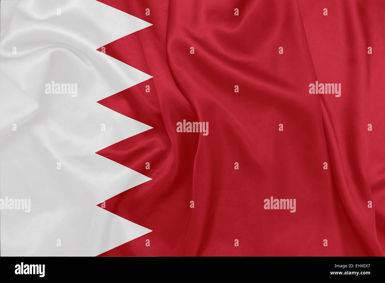 National colors of red and white on shirts hanging in store in Muharraq,  Bahrain, Middle East Stock Photo - Alamy