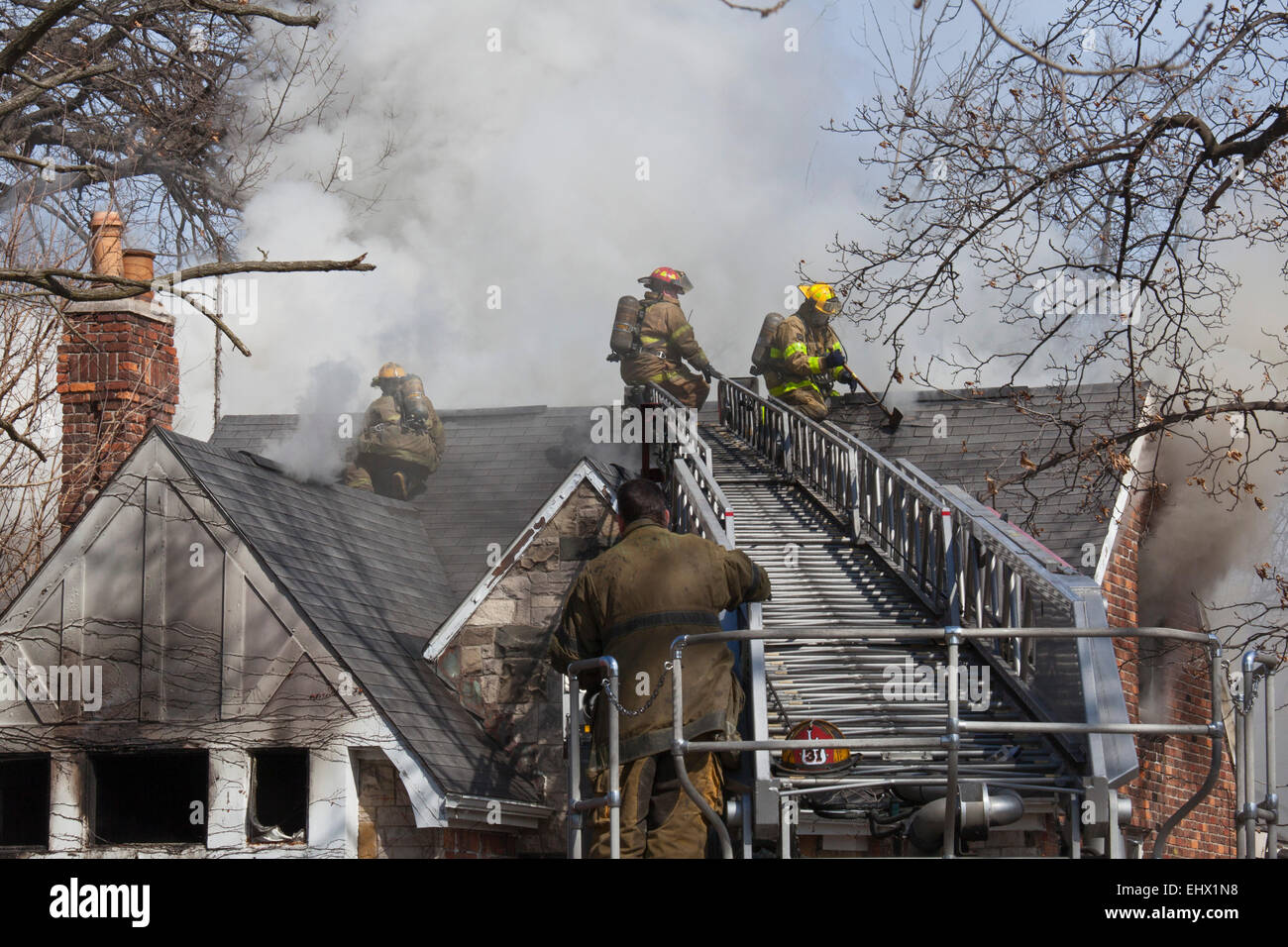 Detroit, Michigan - Firefighters battle a fire which destroyed a vacant home in Detroit's Morningside neighborhood. Stock Photo