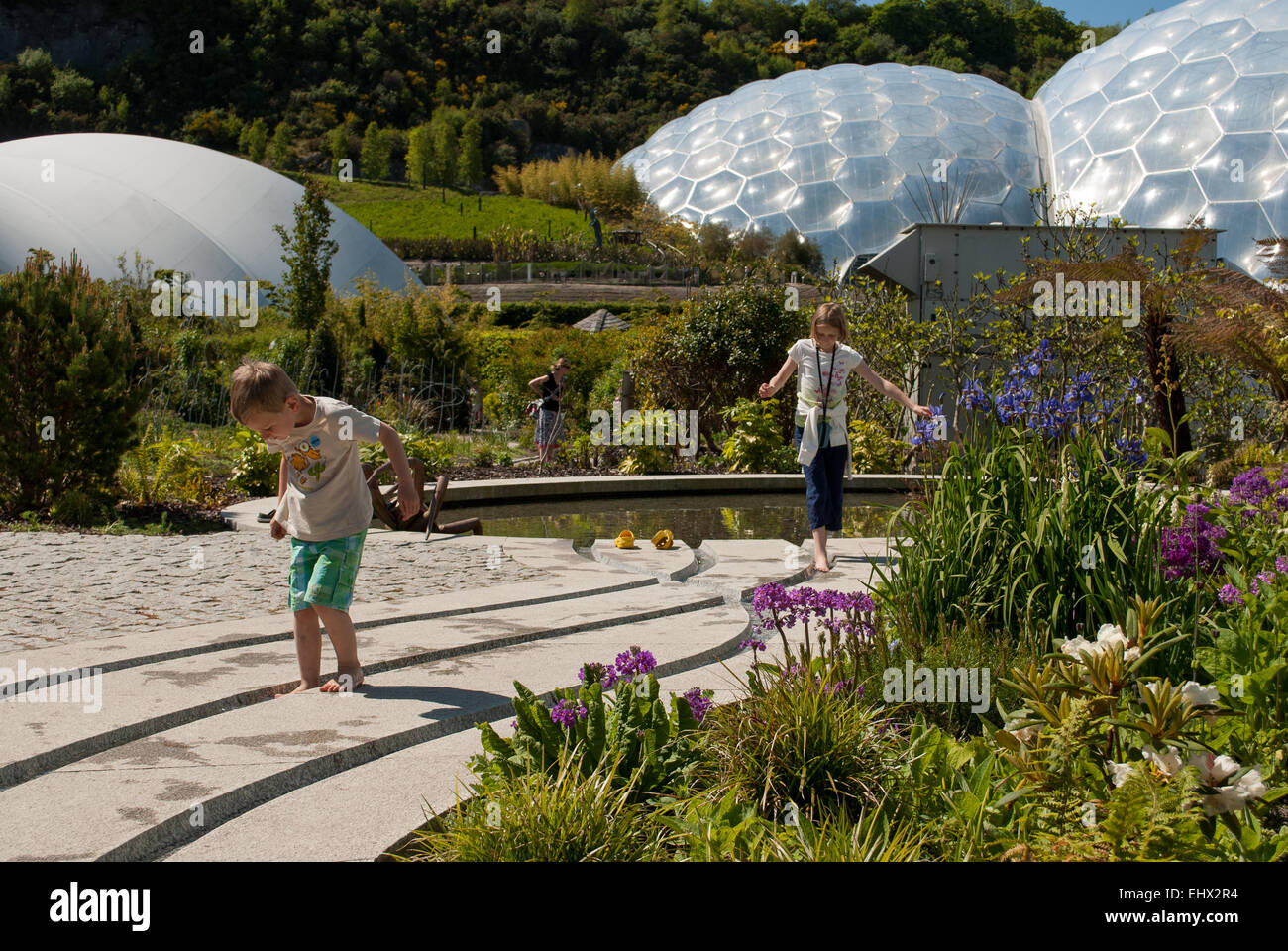 Eden Project Biomes with children in the foreground Stock Photo