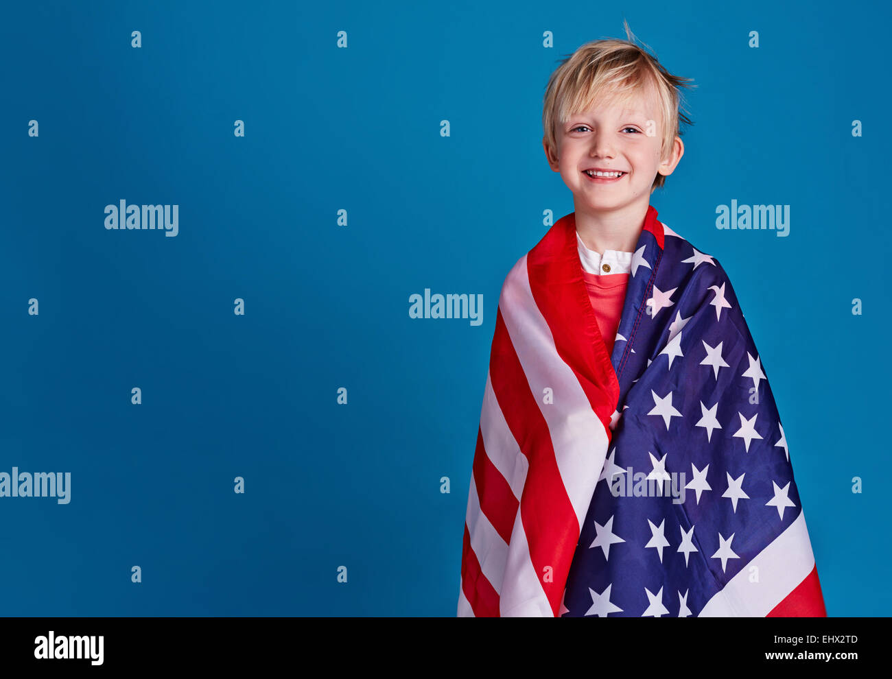 Portrait of happy boy with American flag Stock Photo - Alamy