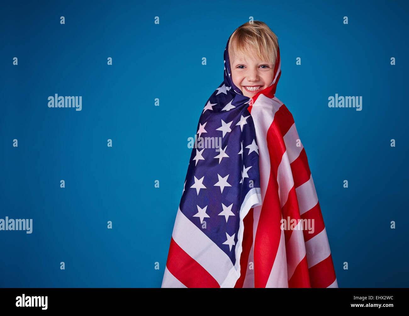 Little boy holding American flag Stock Photo - Alamy