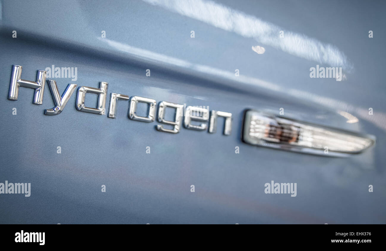 Environmental energy image of the sign on the side of a modern hydrogen car Stock Photo