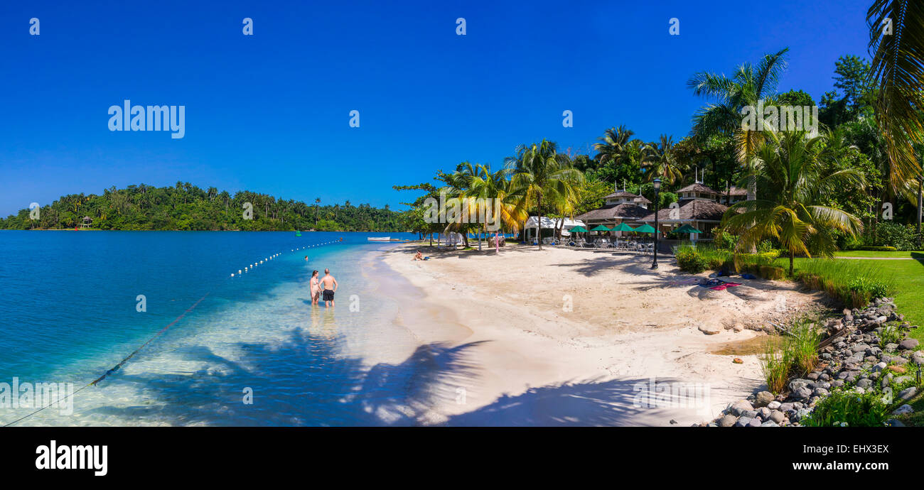 Jamaica, Port Antonio, Errol Flynn Marina, People at beach Stock Photo