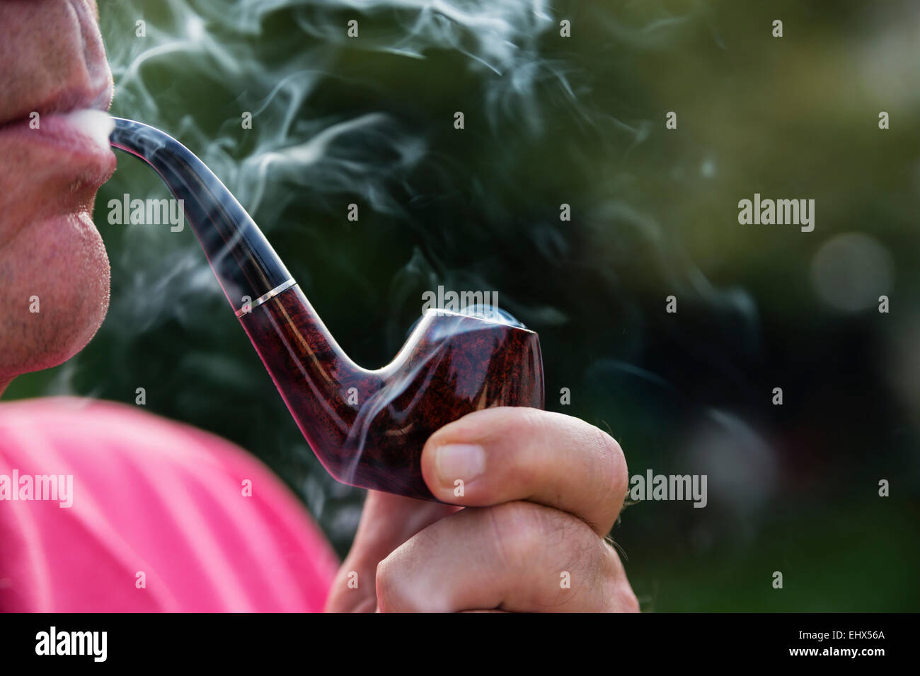 Man smoking pipe Stock Photo
