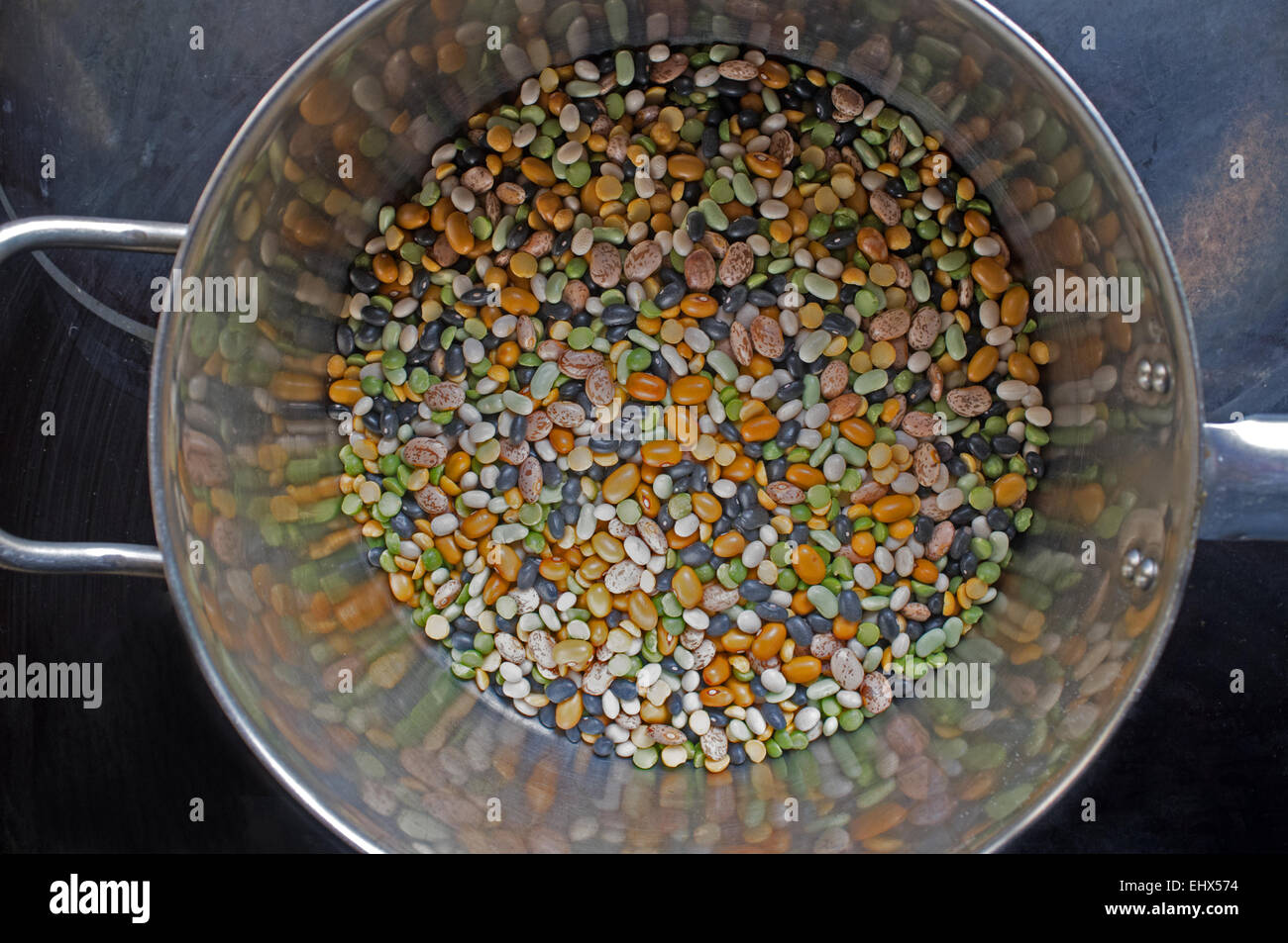 Dried mixed beans in a saucepan prior to soaking Stock Photo