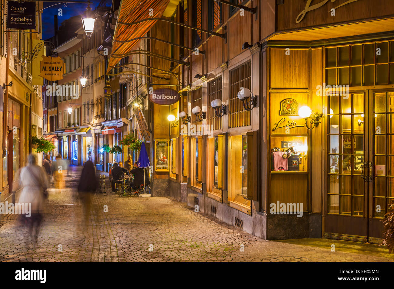 Switzerland, Vevey, Rue du Lac, restaurants and shops at night Stock Photo  - Alamy