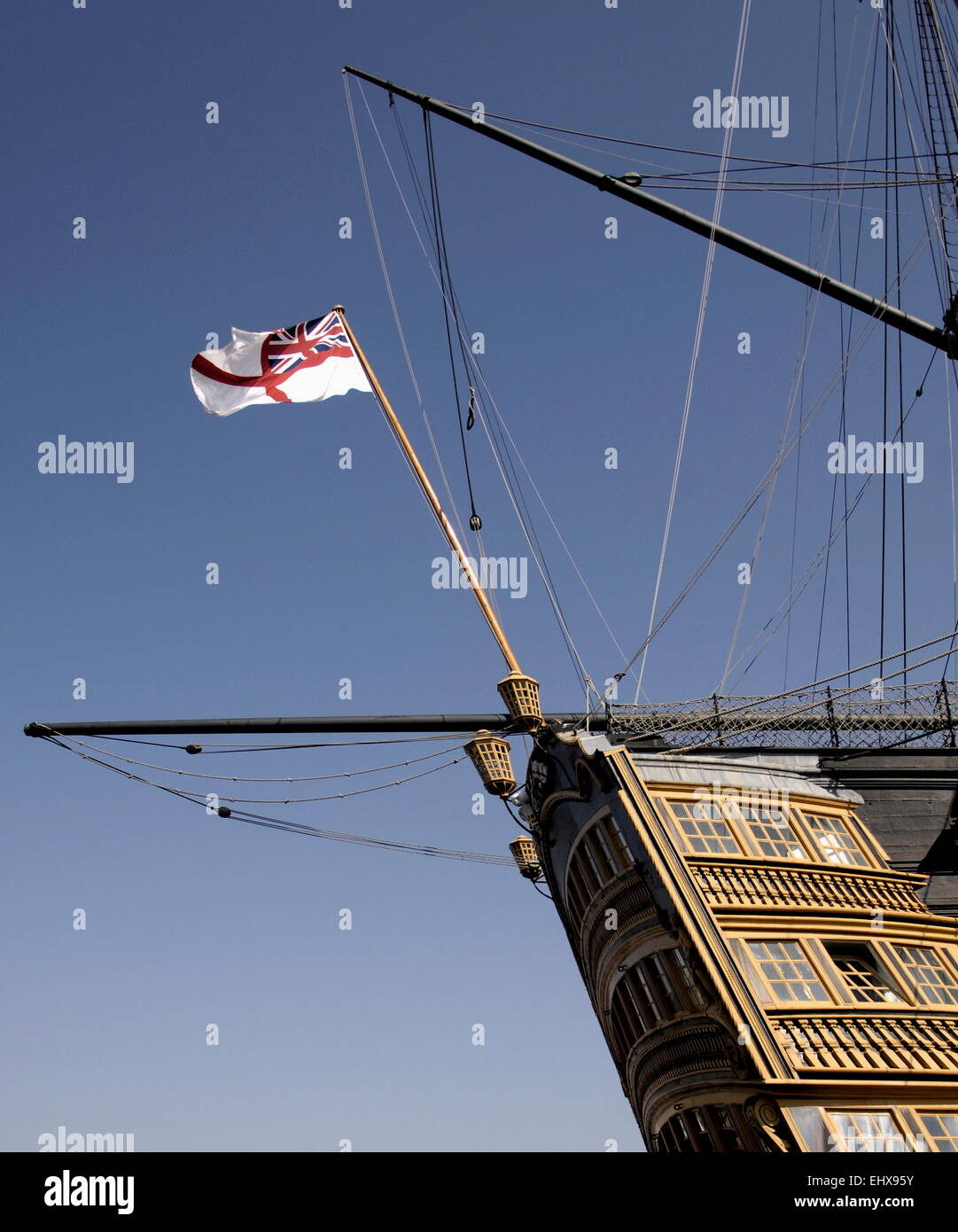 AJAXNETPHOTO. 21ST APRIL, 2011. PORTSMOUTH, ENGLAND. - IN COMMISSION - THE WHITE ENSIGN FLIES FROM THE STERN OF NELSON'S FLAGSHIP H.M.S.VICTORY. PHOTO:JONATHAN EASTLAND/AJAX REF:D112104 1237 Stock Photo