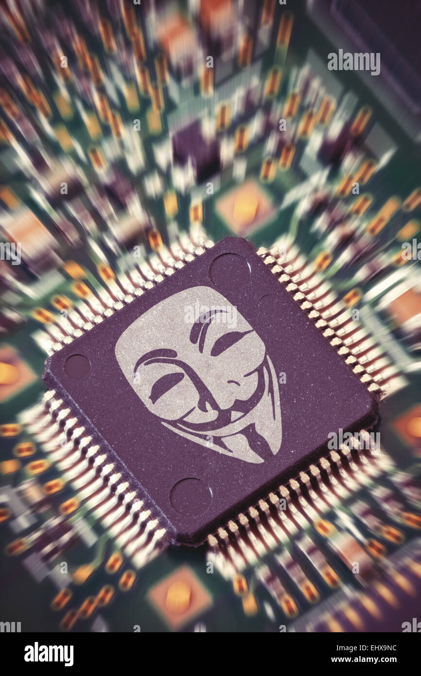 Illustration of a CPU inside a computer with the Guy Fawkes mask on it. Stock Photo