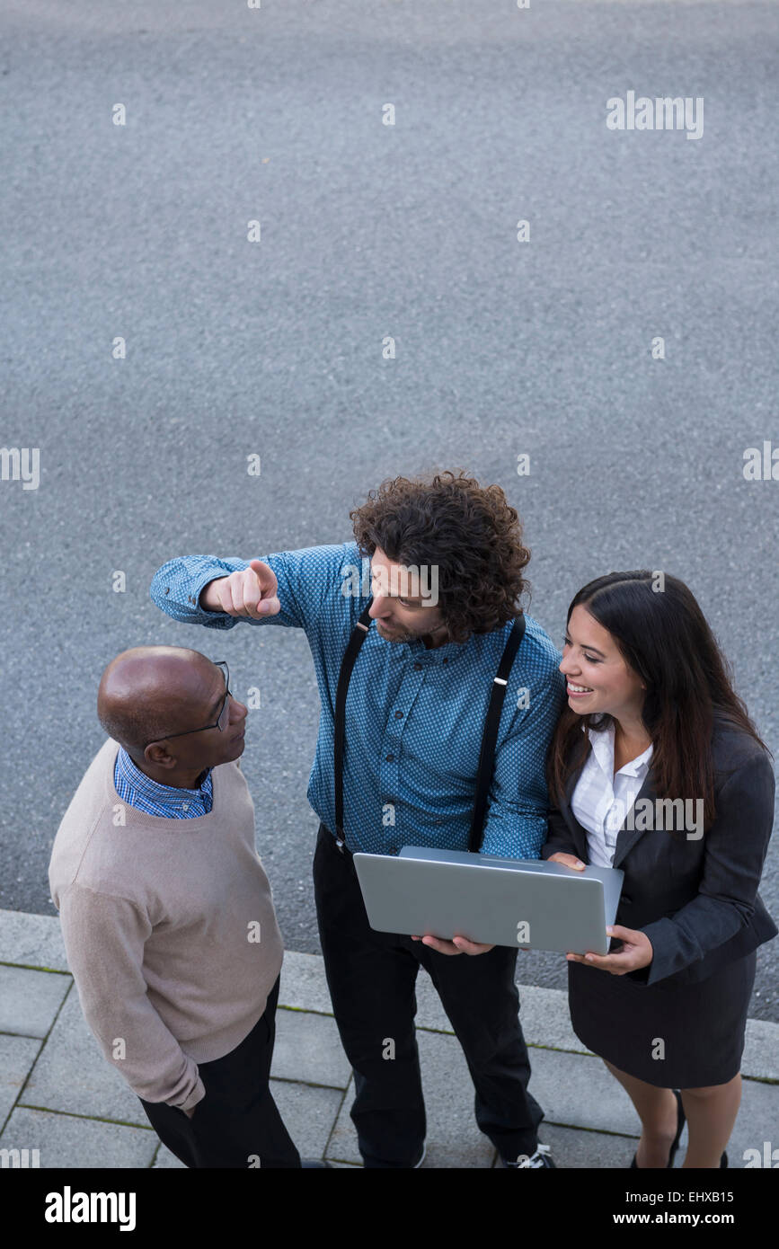 work colleagues meeting laptop computer African Stock Photo - Alamy