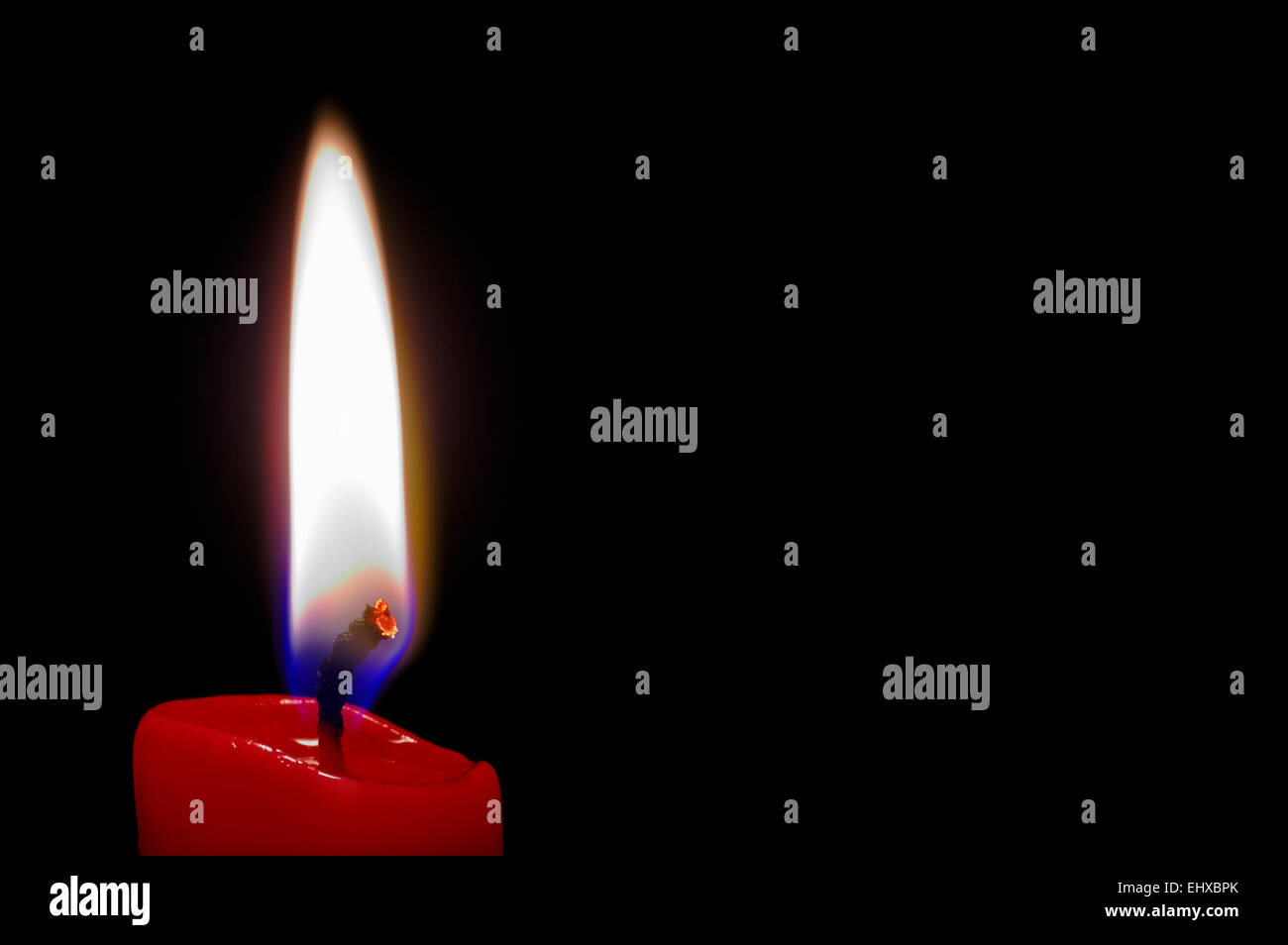 Red candle in black background Stock Photo Alamy