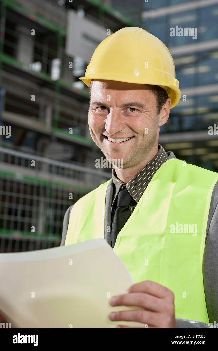 Site manager working at a construction site Stock Photo