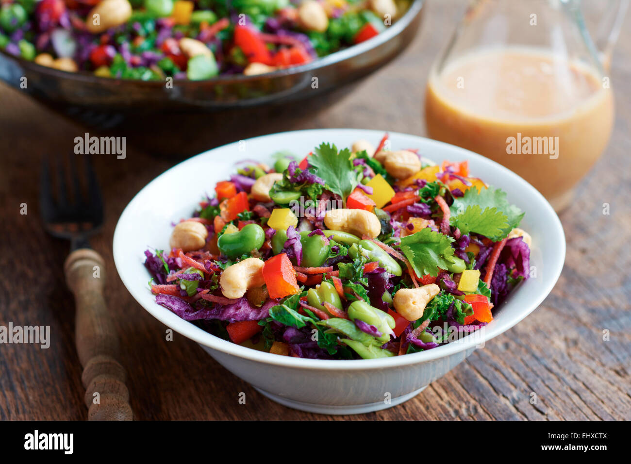Asian slaw salad with red cabbage, kale, fava beans, cashew and