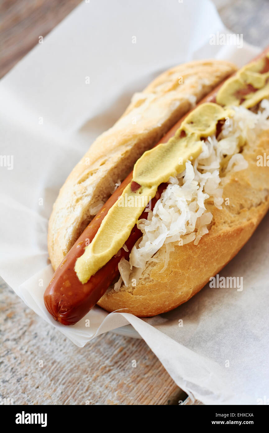 Vegan hot dog with sauerkraut and mustard on napkin Stock Photo Alamy