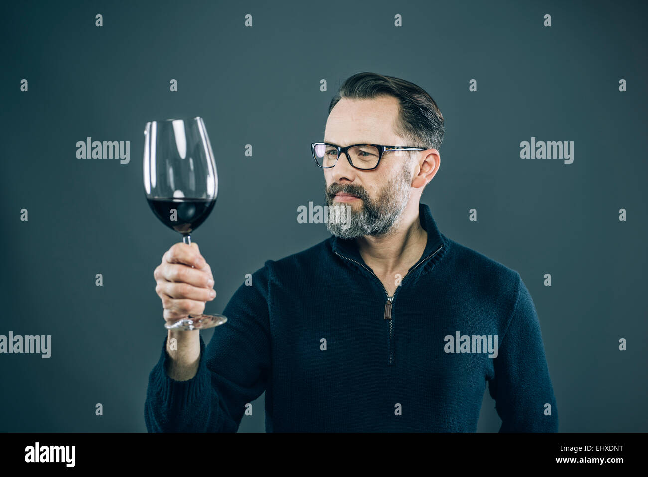 Man tasting red wine Stock Photo - Alamy