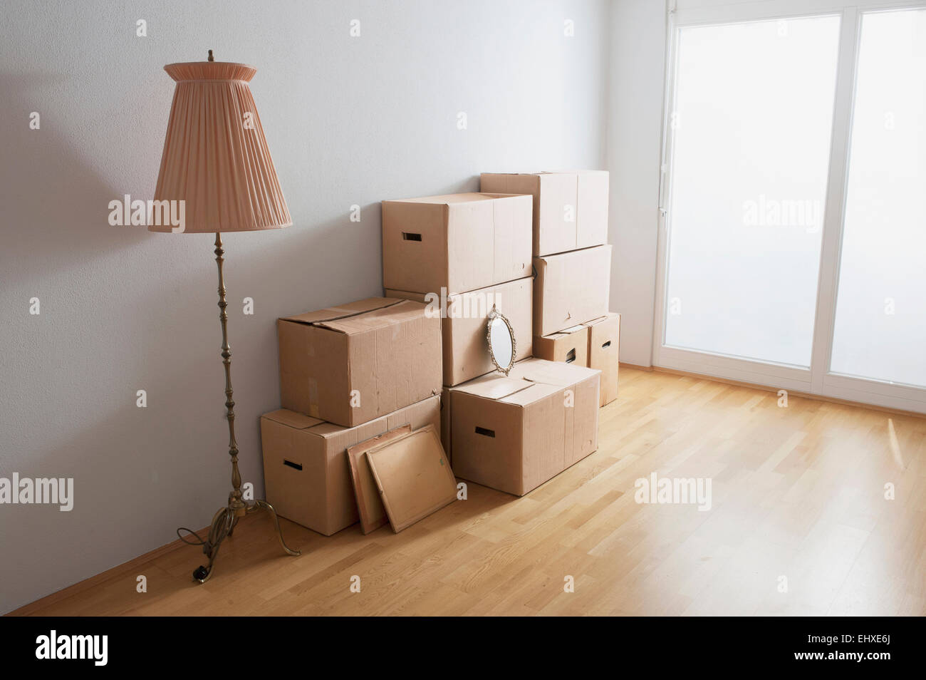 Stack of cardboard boxes in a room, Bavaria, Germany Stock Photo Alamy