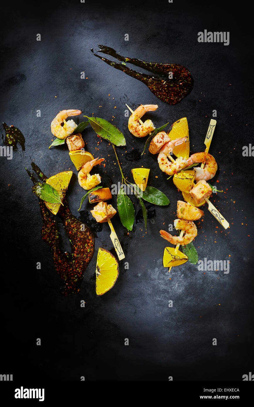 Foodart, grill skewer with shrimps and salmon, red chilli Stock Photo
